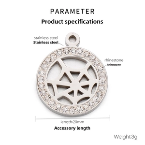 Macro view of a 20mm stainless steel spider web pendant with sparkling cubic zirconia