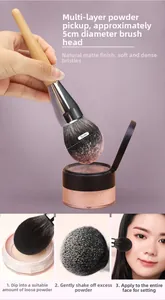 Detail of 5cm large powder brush with soft bristles and wooden handle for matte finish