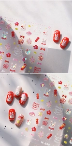 Detail of New Year nail stickers with 3D rabbit and firework embossed patterns
