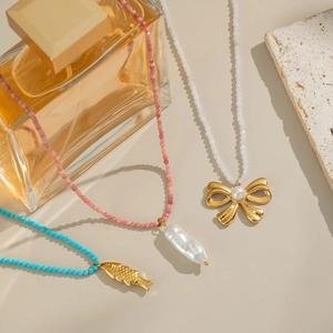 Ocean style beaded necklaces featuring starfish turtle bow and pearl pendants set
