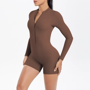 Close-up of coffee brown athletic romper with front zipper and hollow back detail