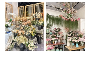 Detailed arrangement of synthetic pompon flowers in stylish vases for home interior decor