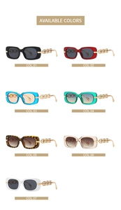 Matrix layout of seven colorful square sunglasses with gold chain temples on white background