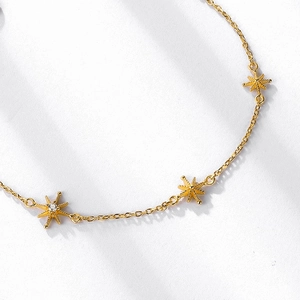 Elegant gold S925 silver star bracelet featuring shimmering zircon charms for women