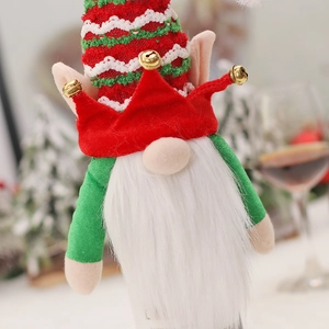 Christmas gnome wine bottle cover with red striped hat and golden bell for table decor