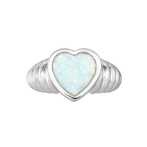 Detailed macro view of heart-shaped white opal stone set on a wavy silver ring band
