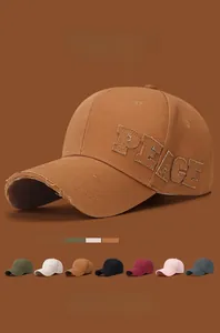 Casquette baseball délavée avec broderie PEACE et sept coloris tendance disponibles