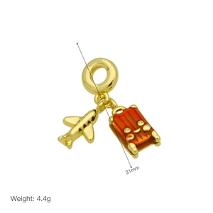 Golden travel charm with orange suitcase and airplane, 31mm length and 4.4g weight