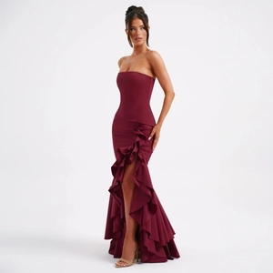 Detailed close-up of wine red off-shoulder maxi dress with ruffled layers and high slit