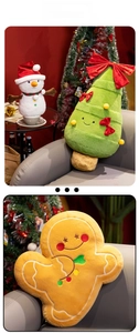 Detail of Christmas snowman, tree, and gingerbread man plush toys in a cozy setting