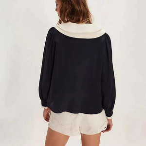 Back view of French style bow chiffon shirt showing large lapel and fluid drape