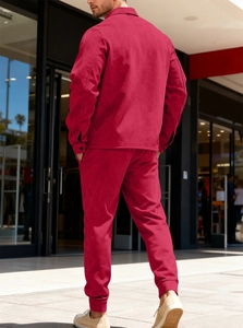 Back view of a heavy faux suede maroon jacket and joggers set for men on street model
