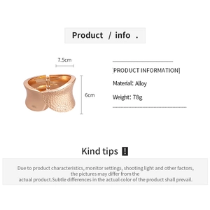 Detailed dimension guide for wide gold textured cuff bracelet with alloy material specs