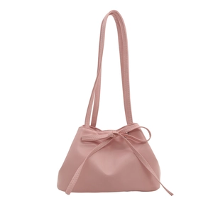 Pink PU leather shoulder bucket bag with drawstring bow and minimalist design
