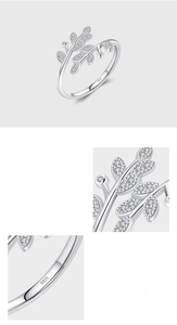 Detailed view of S925 sterling silver stamp and micro-set zircon on leaf ring