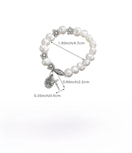 Baroque faux pearl bracelet with cross and Virgin Mary charms and size specifications