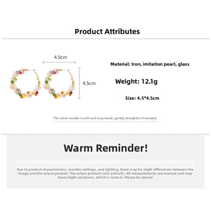 Detail showing colorful glass beads and faux pearls wrapped on 4.5cm round hoop earrings