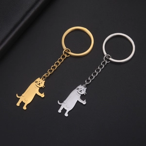 Polished gold and silver cat-shaped stainless steel keychains in a standing pose
