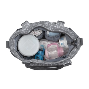 Interior view of grey diaper bag with multiple storage pockets and arrow pattern
