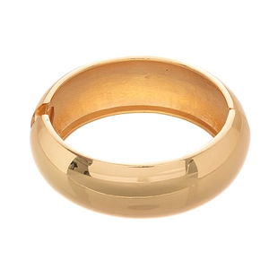 Polished gold wide metal cuff bracelet with geometric irregular design and hinge closure