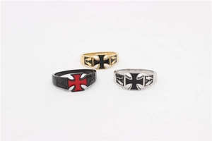Three vintage men's titanium steel rings with cross patterns in various color finishes