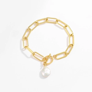 Golden chunky chain necklace with baroque pearl pendant and OT toggle clasp on white background