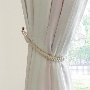 Bohemian hand-woven cotton curtain tieback with natural wooden bead and minimalist rope