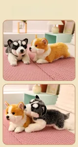 Detailed view of plush husky and corgi dog toys in a cozy home setting with a pink blanket