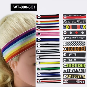 Close-up of assorted non-slip elastic sports headbands featuring vibrant patterns and prints