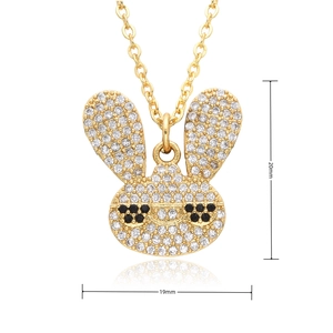 Detailed view of a gold rabbit pendant with white cubic zirconia and size dimensions