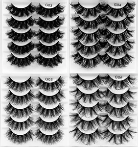 Detailed comparison of four dense messy curly false eyelash styles G03 to G06 on white tray