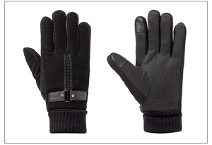 Detail of winter motorcycle gloves with non-slip palm dots and knit ribbed cuffs