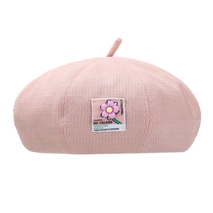 Pink waffle knit beret with colorful floral patch and stylish Korean painter style design