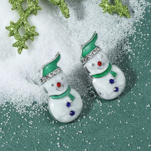 Detail of Christmas snowman earrings with white enamel and sparkling blue rhinestones