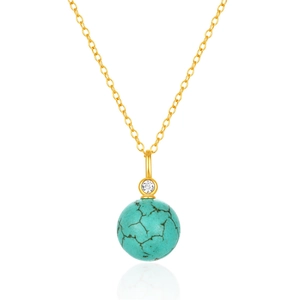 Detail of a gold chain necklace with a turquoise spherical bead and a sparkling zircon stone