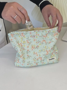Floral canvas makeup bag with large capacity for travel storage and toiletries
