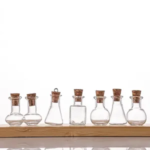 Set of seven assorted miniature glass DIY drift bottles with natural cork stoppers