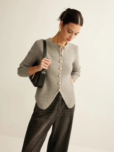 Slim fit grey knit cardigan with vertical ribbed texture and gold buttons on plain background