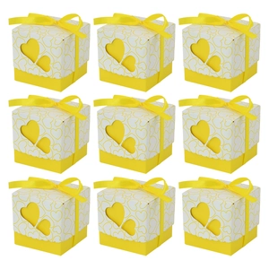 9 yellow wedding favor boxes with hollow double heart design and matching silk ribbons