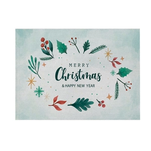Detail showing high-quality canvas texture and festive botanical print on Christmas placemat