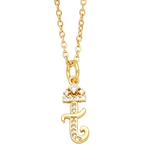Detailed close-up of a golden lowercase letter 't' necklace pendant with a zircon crown