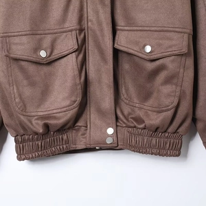 Brown faux suede jacket with silver snaps and large front pockets in a relaxed fit style