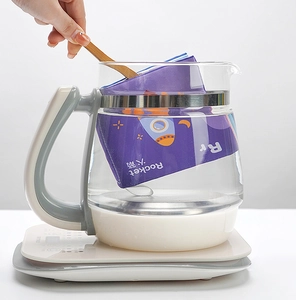 Macro detail of glass health pot base showing touch control functions and rocket infuser
