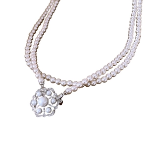 Double-layered hollow snowflake pearl necklace with vintage silver pendant and rhinestones