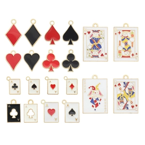 Variety of alloy enamel poker card charms featuring hearts and spades in a flat lay display