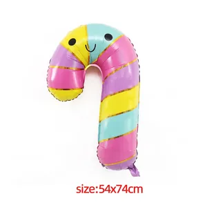 Detail of candy cane foil balloon with colorful stripes and smiley face, size 54x74cm
