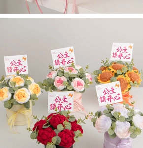 Detailed handmade crochet rose and sunflower bouquets in festive cylindrical gift boxes