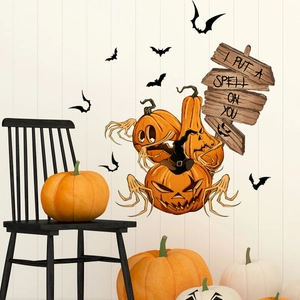 Halloween wall stickers featuring stacked pumpkins, wizard hat and bats on white wood wall