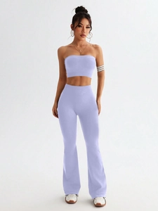 Detail of light purple ribbed knit yoga set with tube top and high-waist flare pants