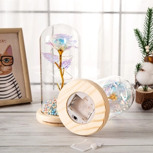 Iridescent gold foil rose in glass dome with LED lights and wooden base home decor